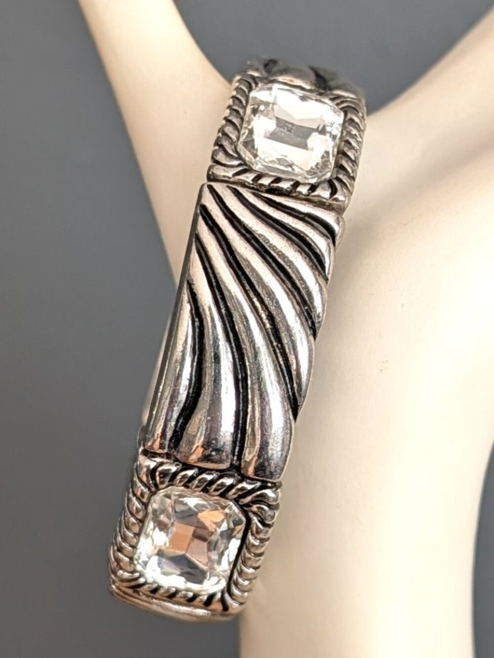 Silver metal with black detail and faceted glass stretch bracelet